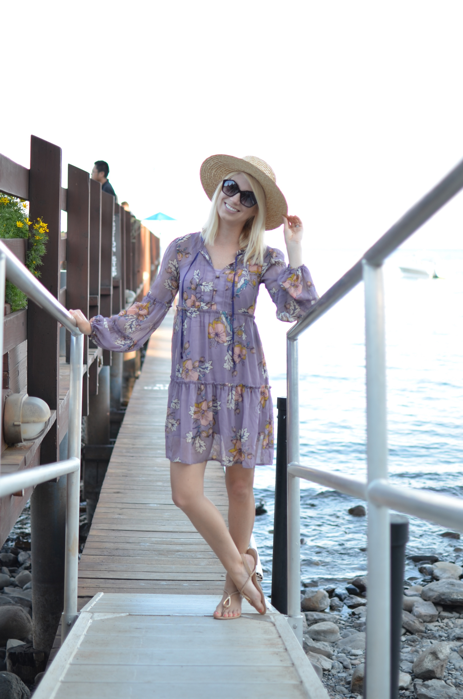 Stefanie Schoen of The Style Safari wears Target Lilac floral tiered dress, flat brim straw hat, summer style