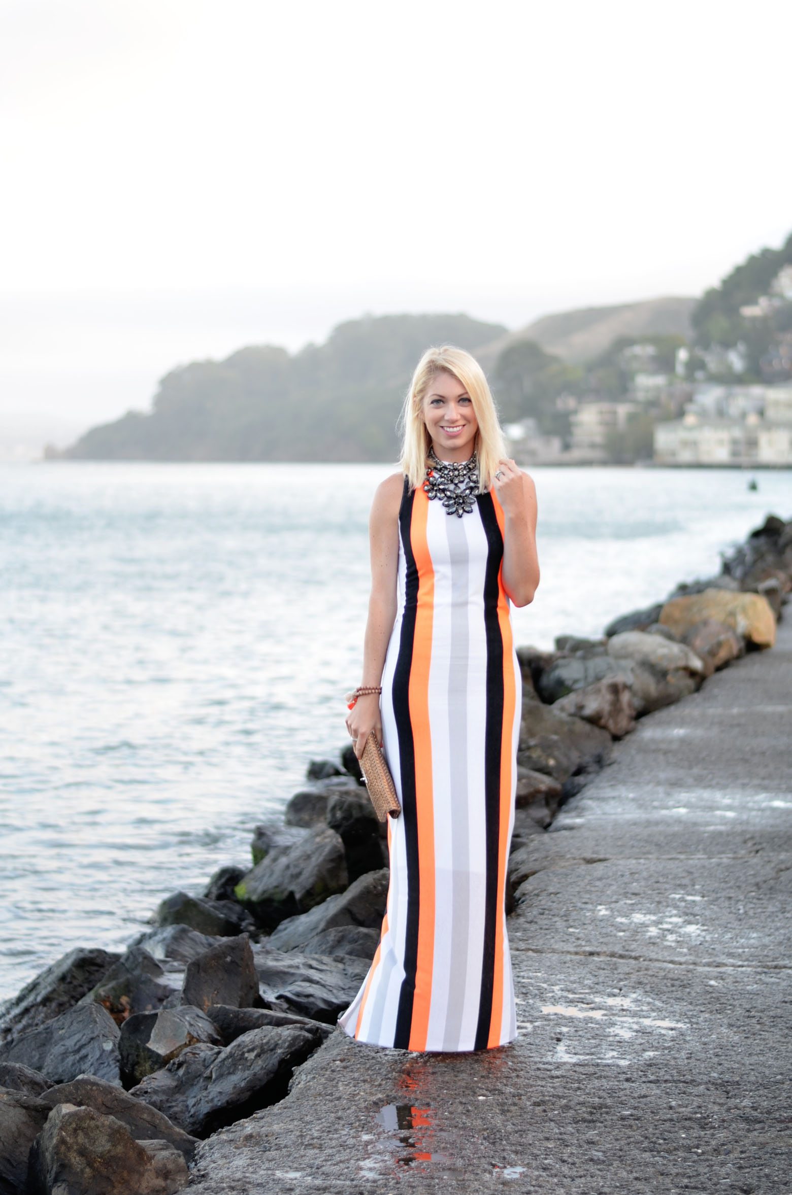 High neck vertical black white orange stripe dress made by Stefanie Schoen of The Style Safari