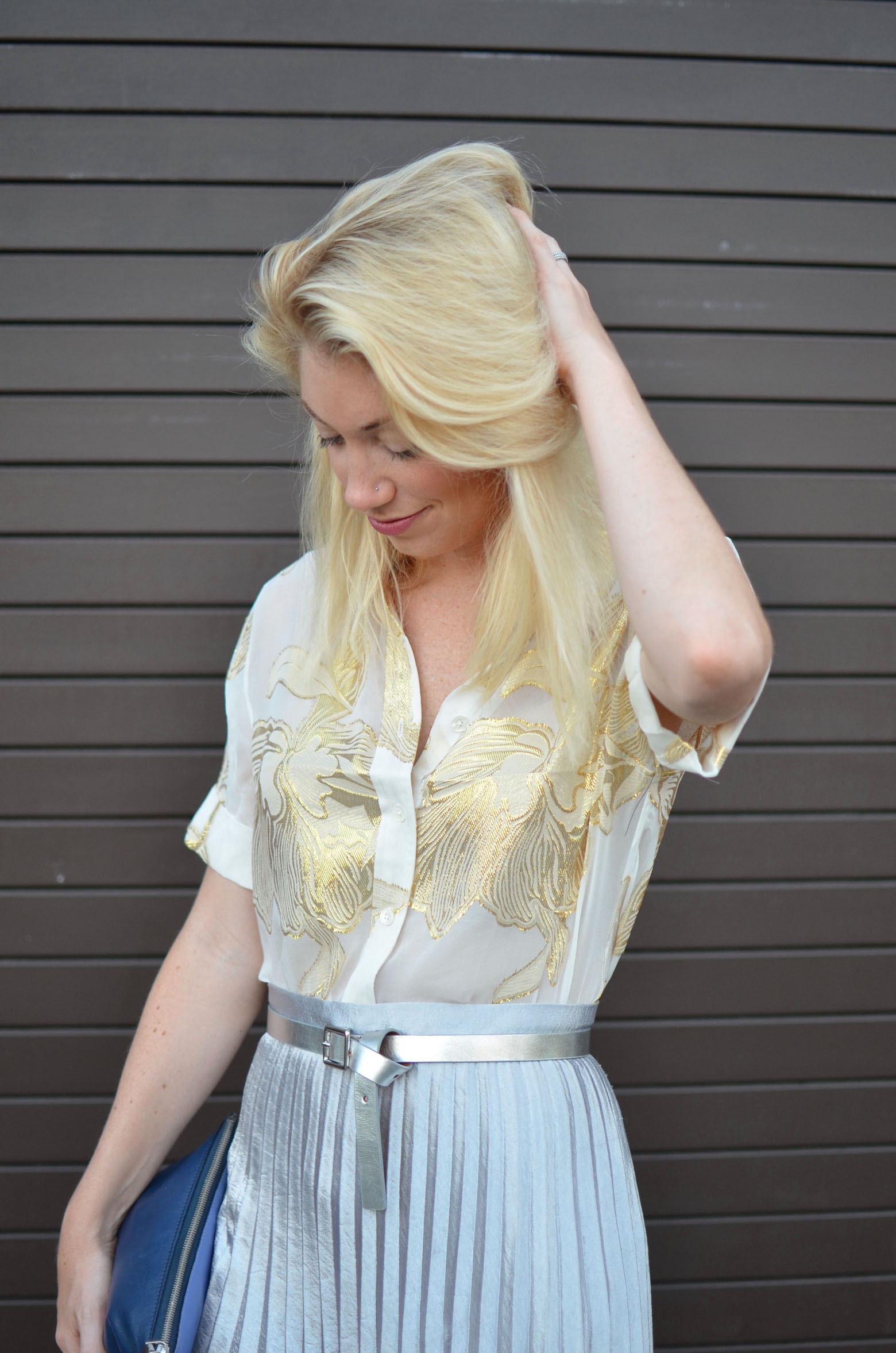 Stefanie Schoen wears Equipment gold metallic blouse, ASOS silver pleated skirt, mixed metallic outfit // thestylesafari.com