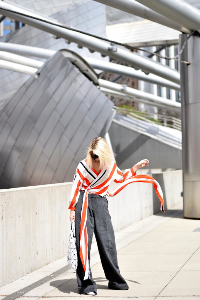 Red stripe wrap top, grey wide leg pants, chicago millennium park, fashion photography, 