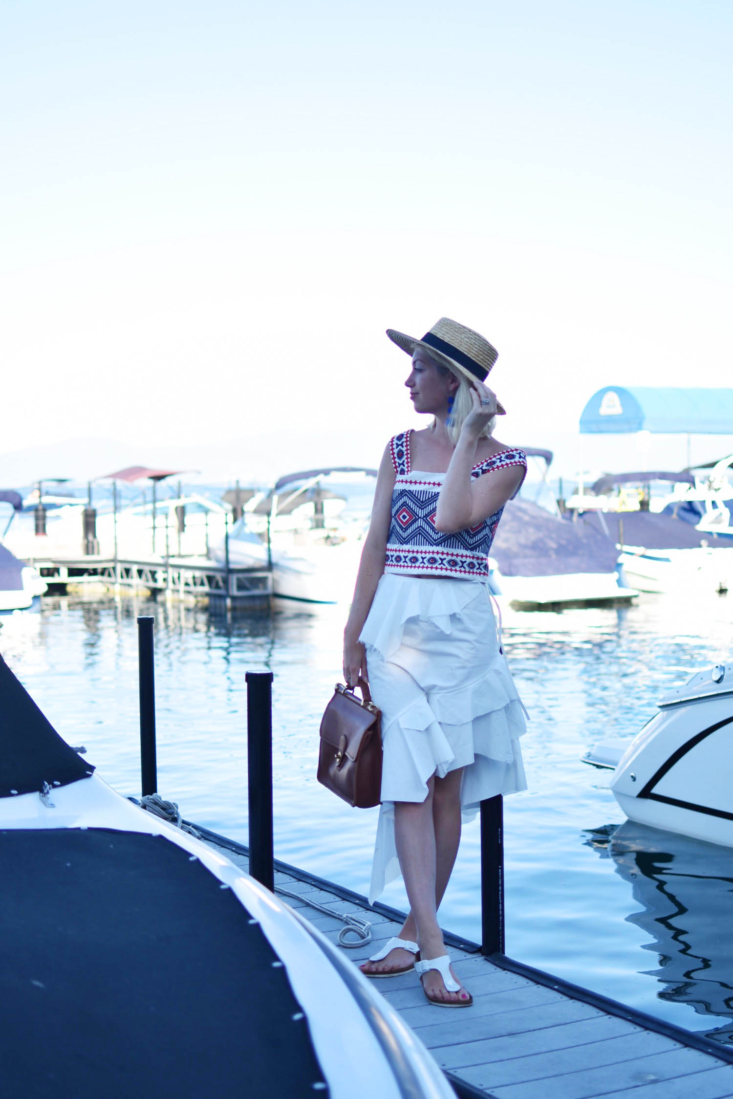 two ways to style an embroidered tank top, white ruffled skirt