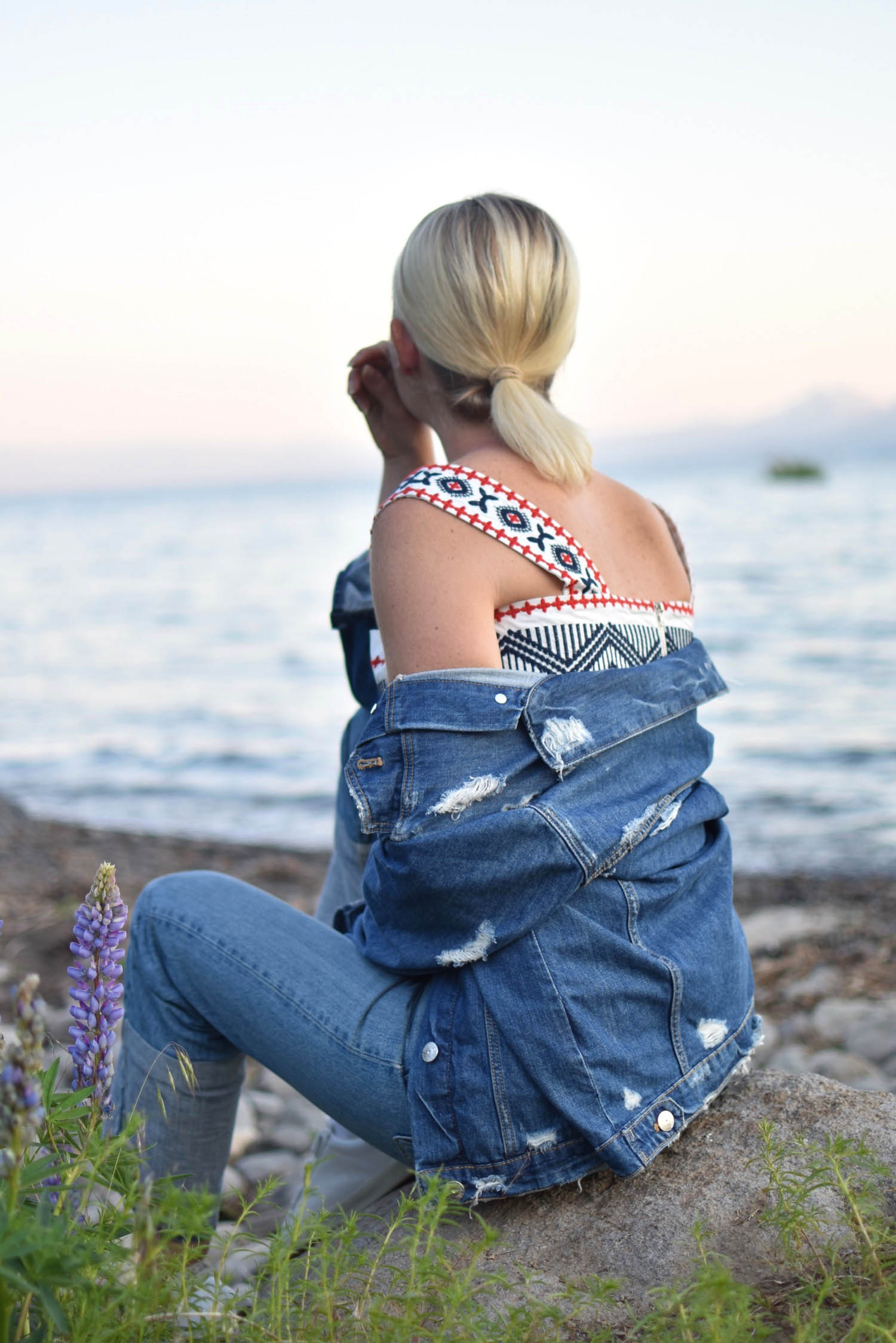 two ways to style an embroidered tank top, denim jacket in Lake Tahoe