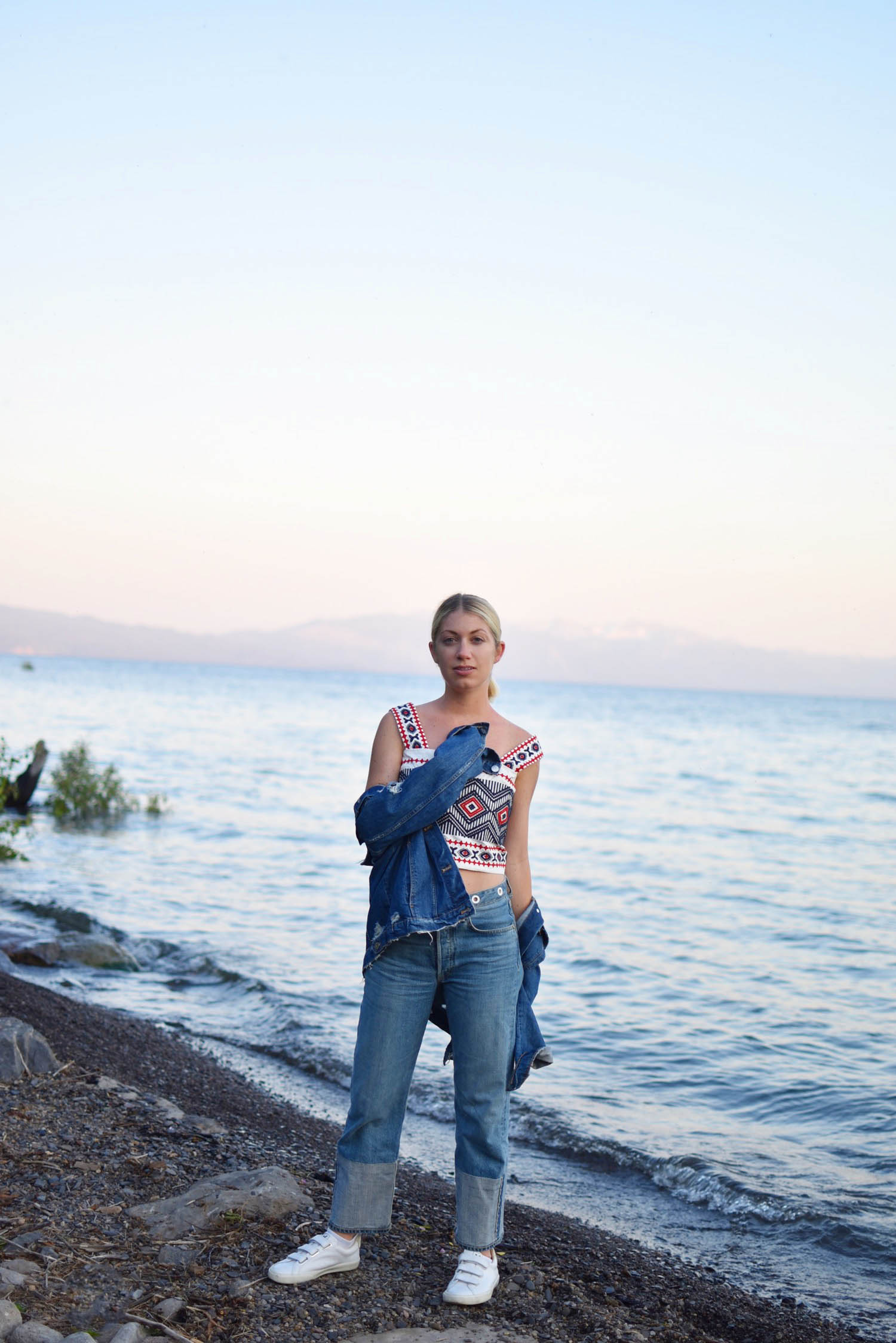 two ways to style an embroidered tank top, denim jacket in Lake Tahoe