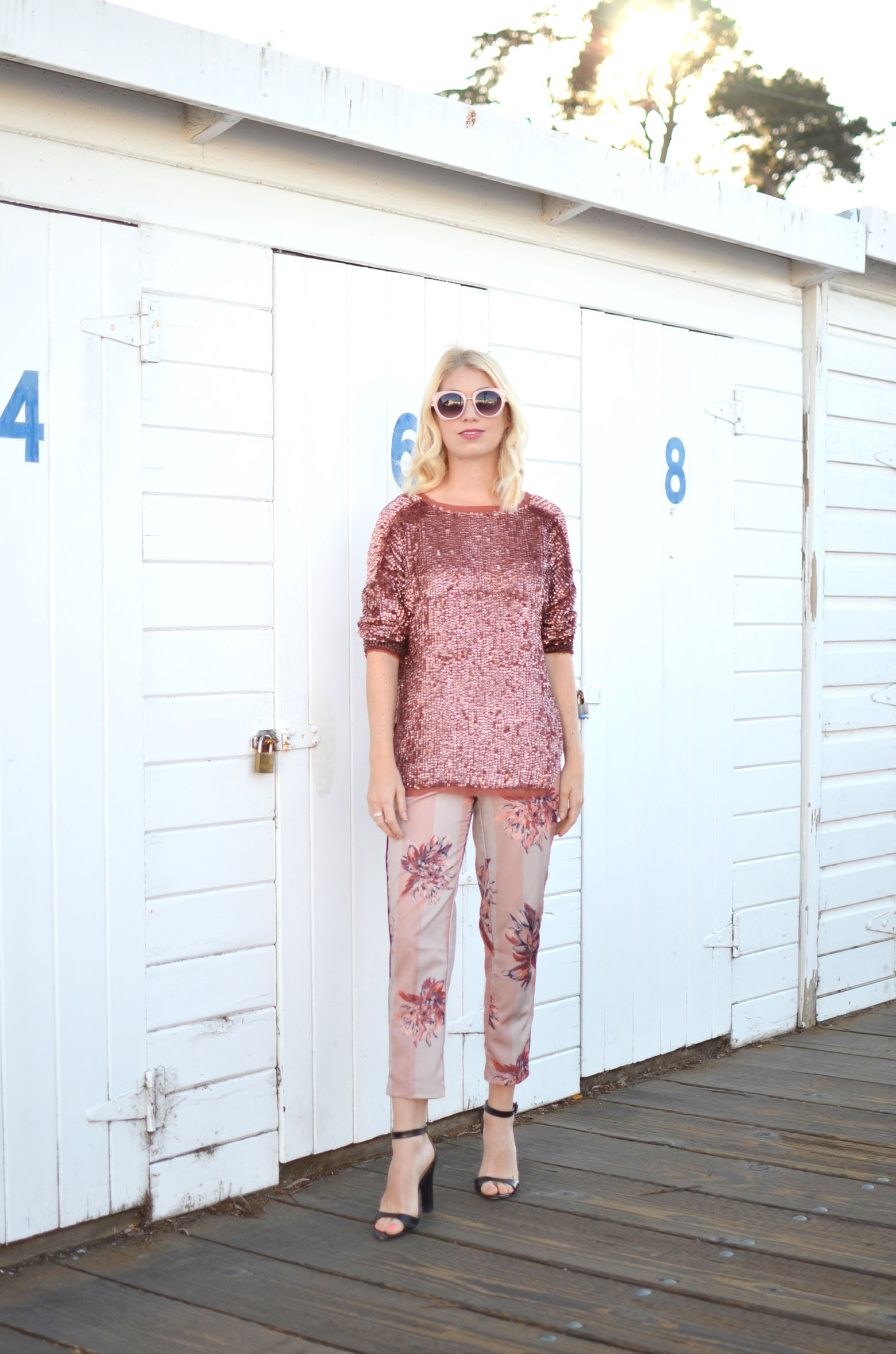 Stefanie from The Style Safari pink sequin sweater, pink floral silk pants, pink sunglasses, head to toe pink outfit // thestylesafari.com