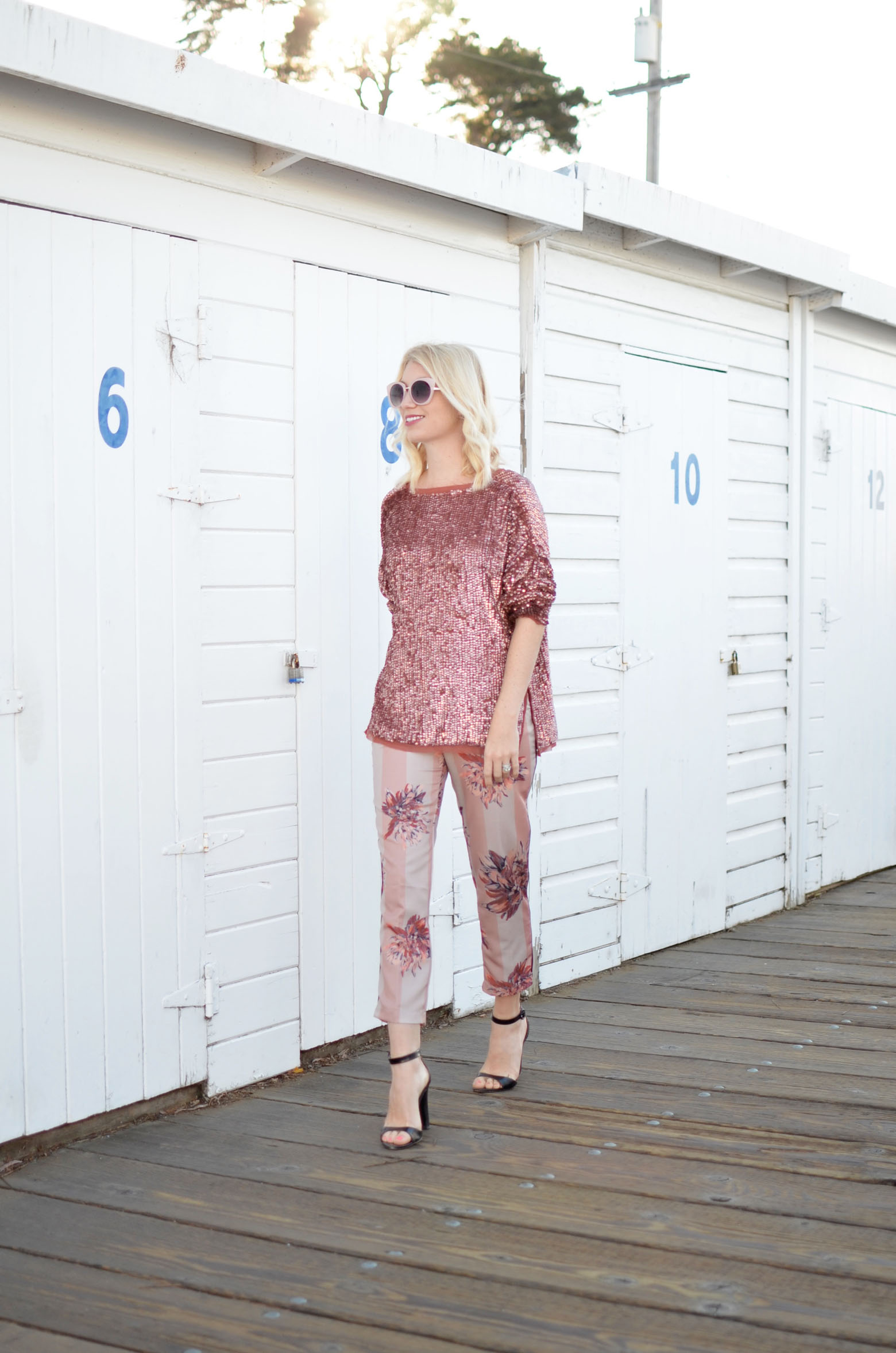 Stefanie from The Style Safari in pajama dressing, pink sequin sweater, pink floral silk pants, pink sunglasses, head to toe pink outfit // thestylesafari.com