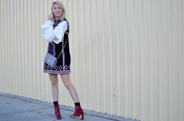 embellished shift dress, very tiered cable knit sweater, red boots, gigi new york grey cross body bag