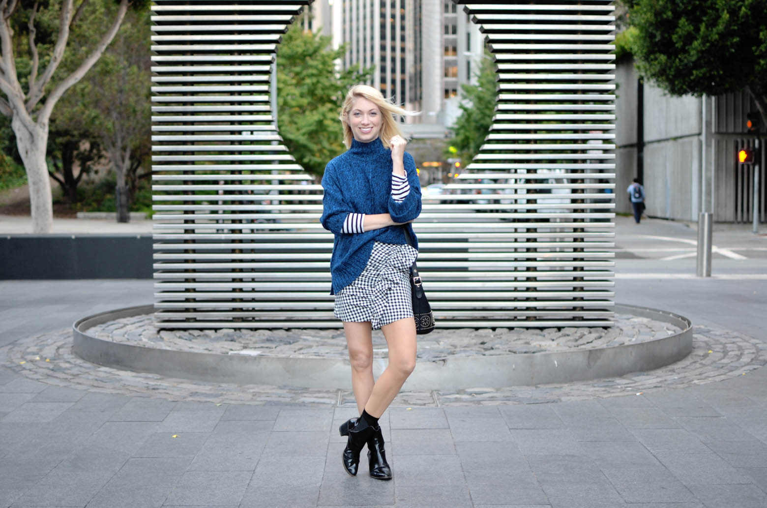 gingham ruffle mini skirt, blue oversize sweater, striped long sleeve tee, casual city street style // thestylesafari.com