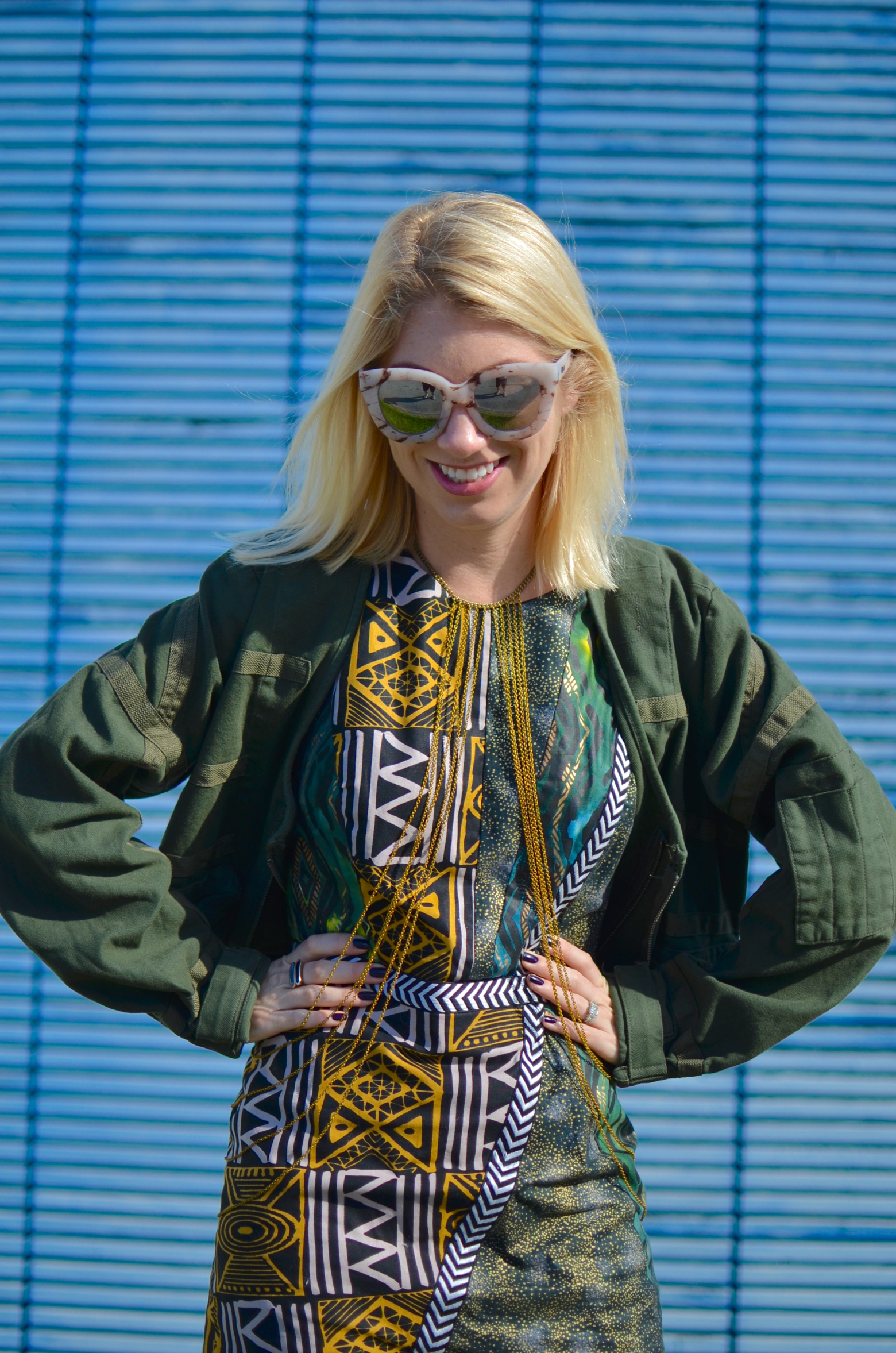 mixed print african dress, army green parachute jacket, gold body chain // thestylesafari.com