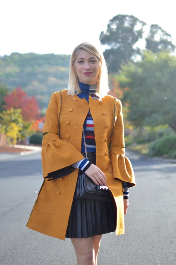 mustard yellow coat, kenzo color block stripe turtleneck, black faux leather skirt, valentino rockstud flats // thestylesafari.com