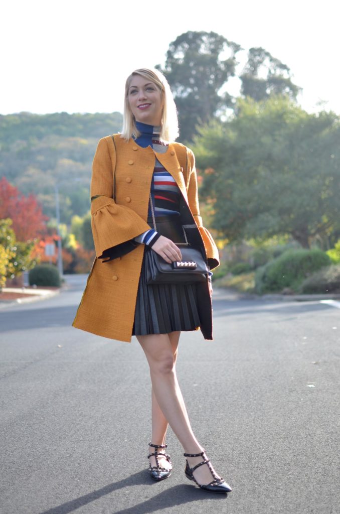 mustard yellow coat, kenzo color block stripe turtleneck, black faux leather skirt, valentino rockstud flats // thestylesafari.com
