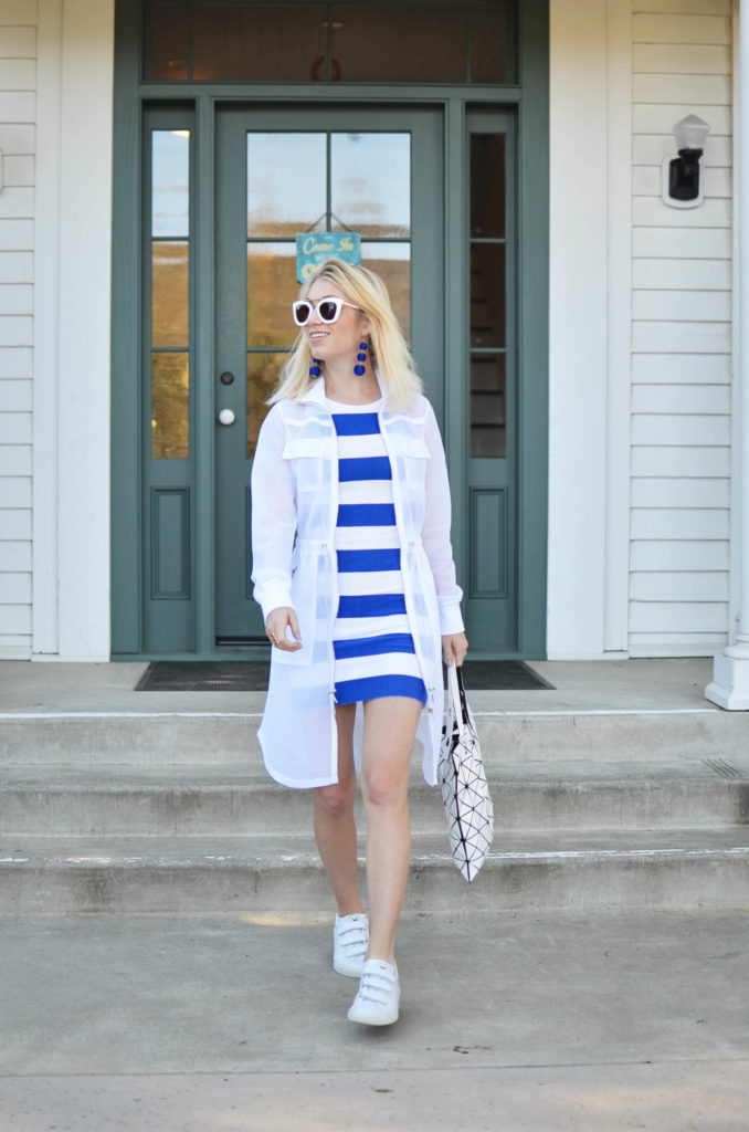 striped short dress and white mesh jacket at farmstead long meadow ranch in Napa Valley