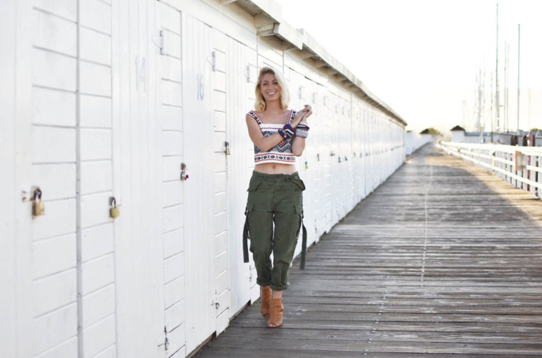 green cargo pants, embroidered white tank top