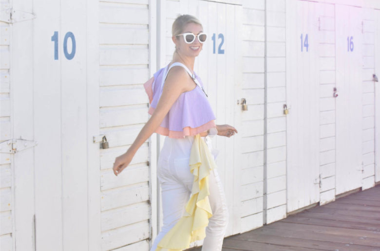 white modern overalls, viva aviva rent the runway pastel ruffle top,