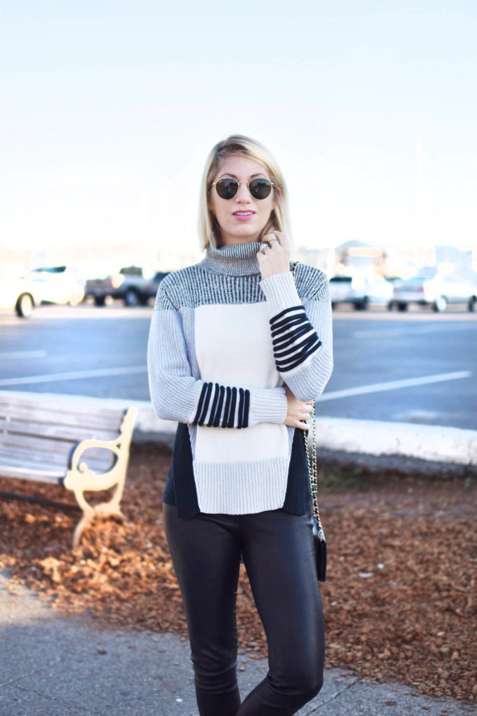 fall transitional style, black leather leggings, asilio color block sweater from rent the runway