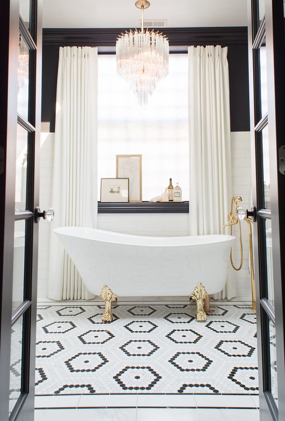 classic and modern black white and marble master bathroom, gold fixtures, high contrast, border tiles