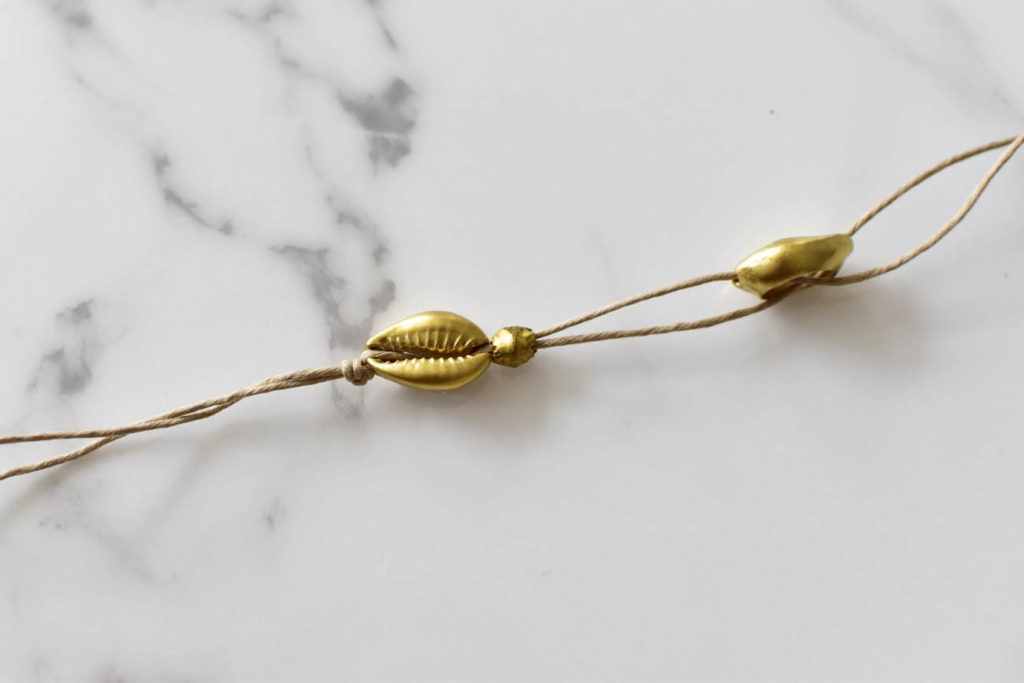 DIY gold cowrie shell necklace