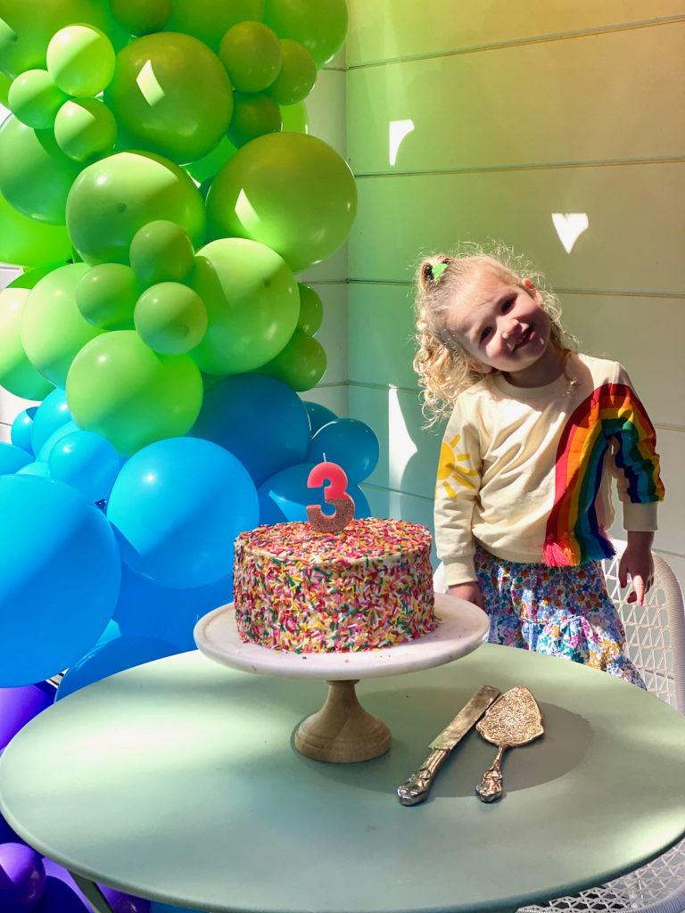 Rainbow birthday party - rainbow balloon arch